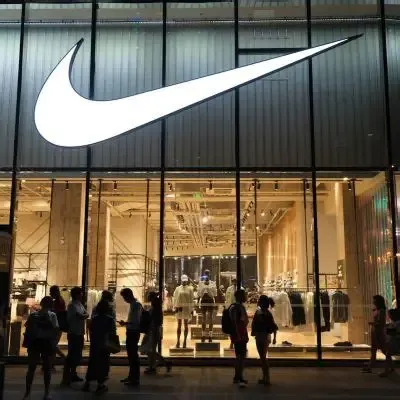 Nike plans job cuts as it forecasts lower sales